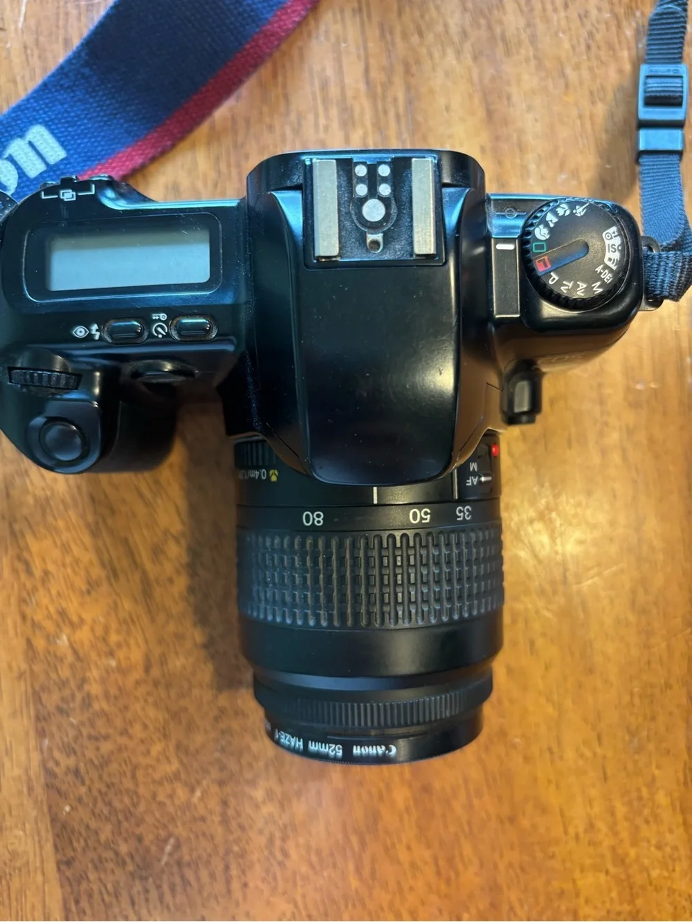 Canon Rebel X Black DSLR Camera with Navy and Red Strap